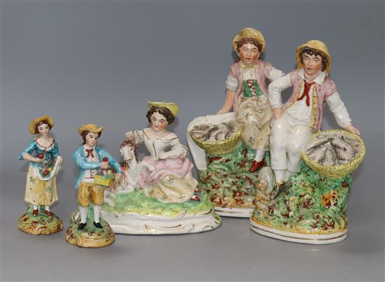 A pair of Staffordshire fisherfolk, another pair and girl seated with goat Tallest 21cm